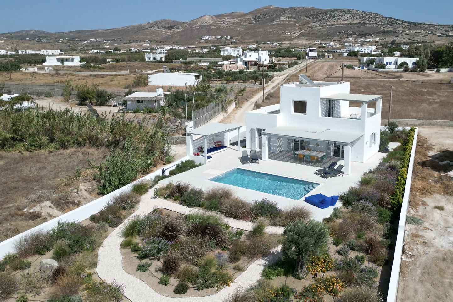 villa aura naxos gems accommodation vacation rentals Kastraki Greece terrace lounge pool garden dining panorama drone mountain view